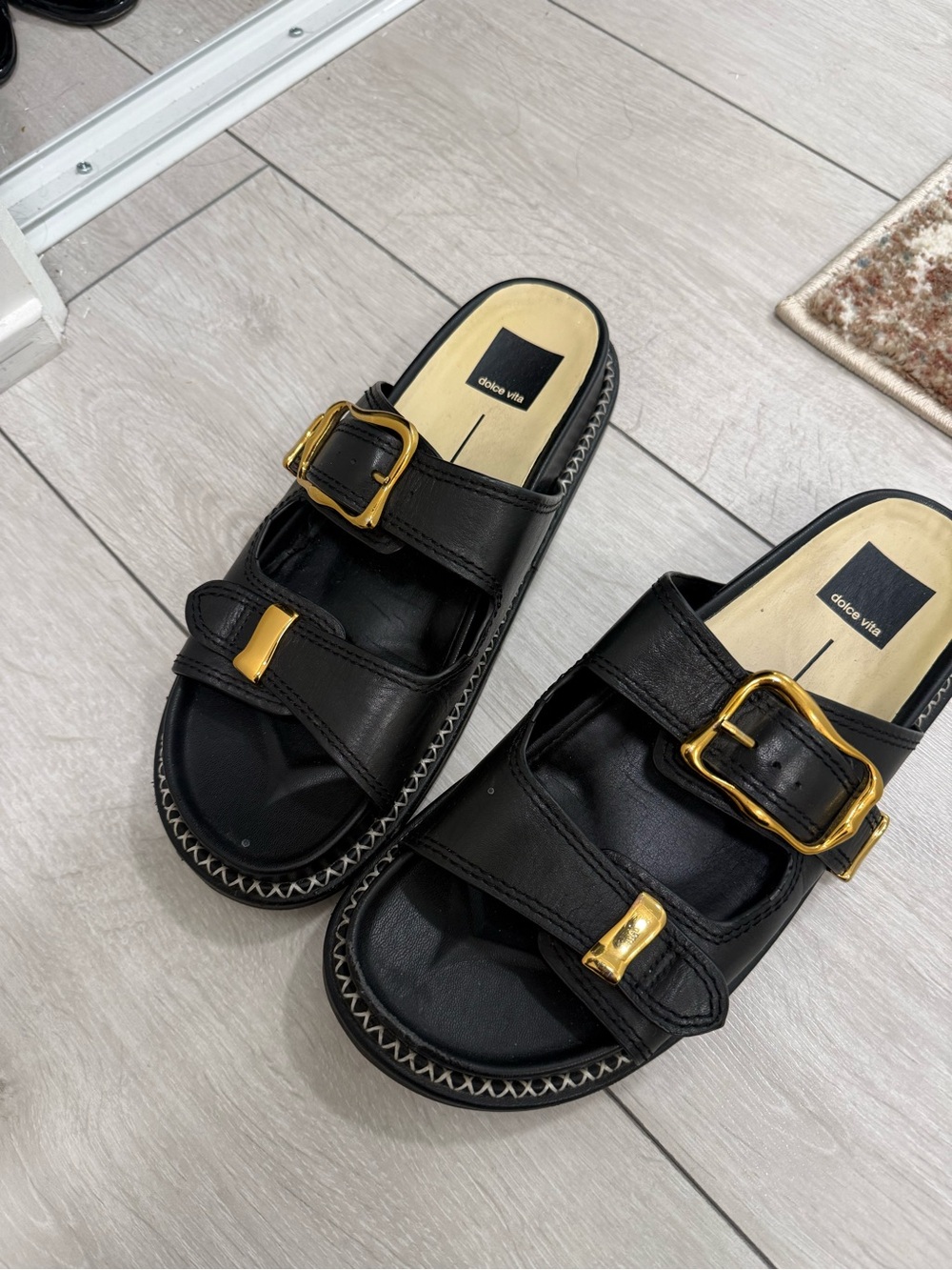 Dolce Vita Black Slide Sandals with Gold Buckle Accents
